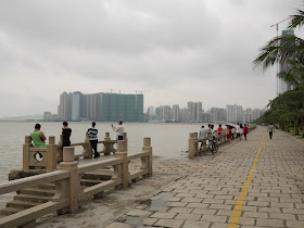 People look at Macau from Lovers' Lane in Zhuhai, China