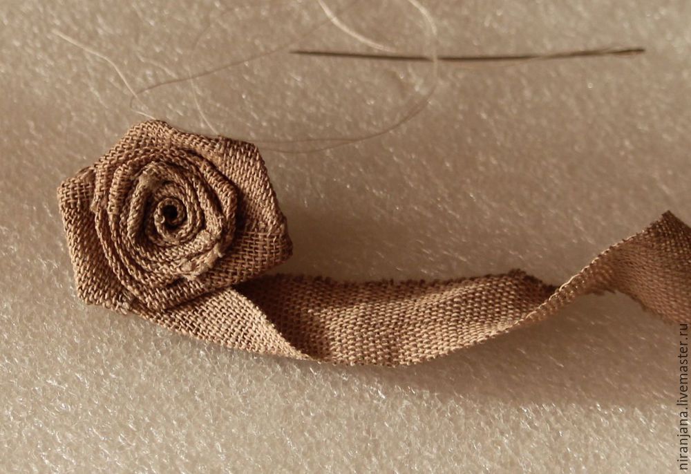 How easy and quick to sew a rose from a fabric or satin ribbon.