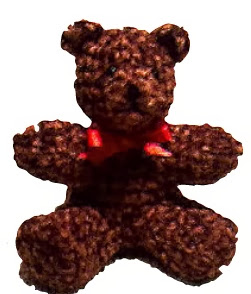 http://priscillascrochet.net/free%20patterns/X%20Ornaments/Chenille%20Bear%20Christmas%20Ornament.pdf