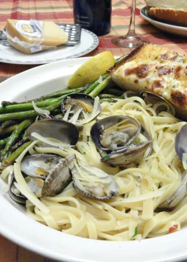 Clams with Linguine in a White Wine Butter Sauce recipe is an easy dinner favorite from Serena Bakes Simply From Scratch. A favorite way to slurp pasta! 
