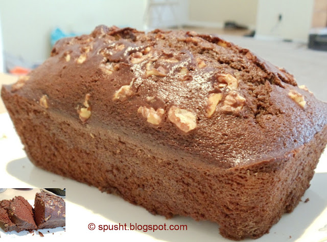 Spusht | eggless chocolate cake topped with walnuts