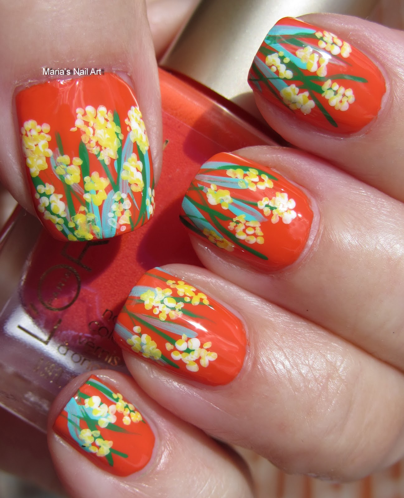 Marias Nail Art and Polish Blog Small pastel yellow flowers on hot orange