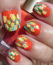 pastel yellow flowers orange nail polish