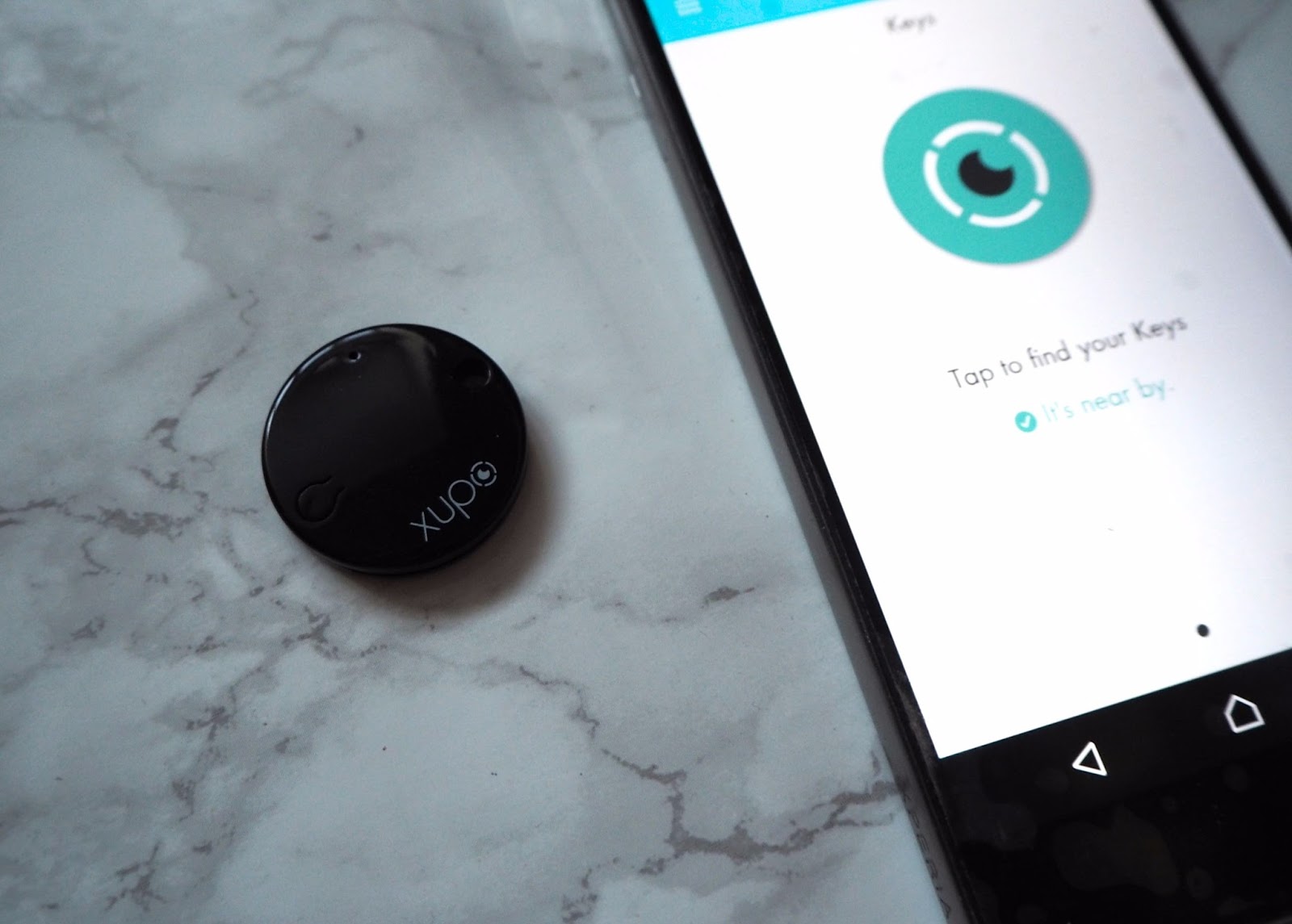 Never Lose Your Keys With Xupo Xupo with phone app