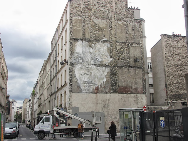 Street Art By Portuguese Artist Vhils On Rue De La Fontaine Au Roi, Paris, France. 3
