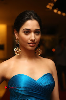 Actress Tamannaah Pictures in Blue Long Dress at Abhinetri Audio Launch  0020