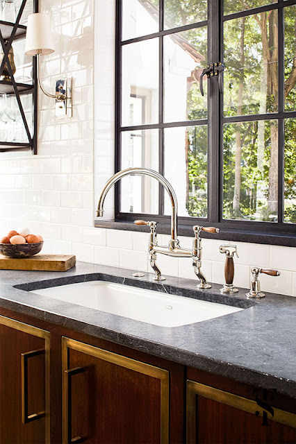 Classic Decor in kitchen of French Tudor Renovation by Summer Thornton