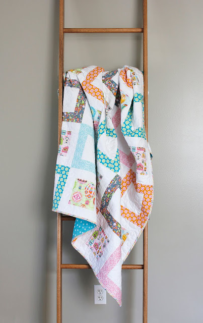 Cute throw quilt called Framed Squares - a free quilt pattern from A Bright Corner