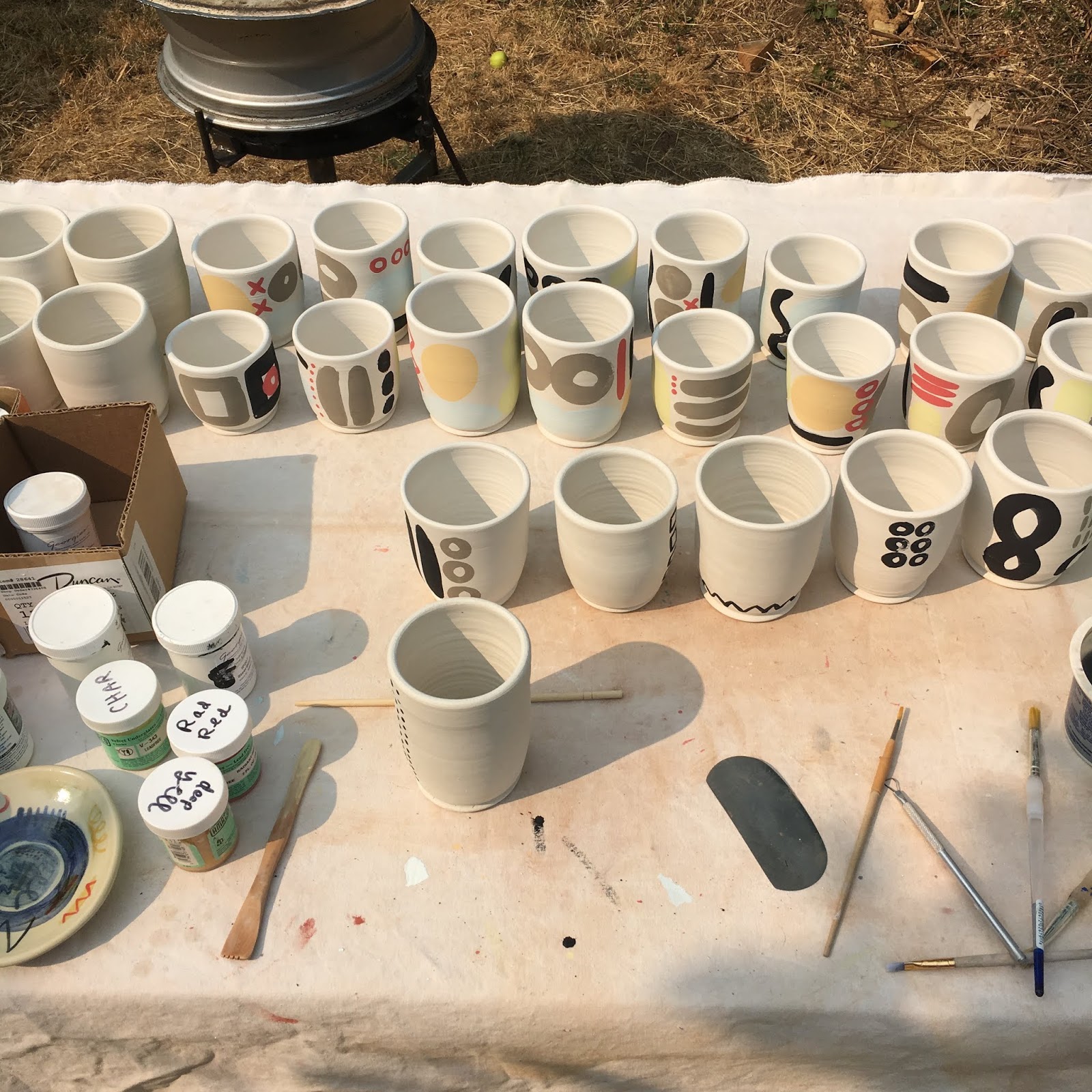 Kim Murton Painting cupsa few steps