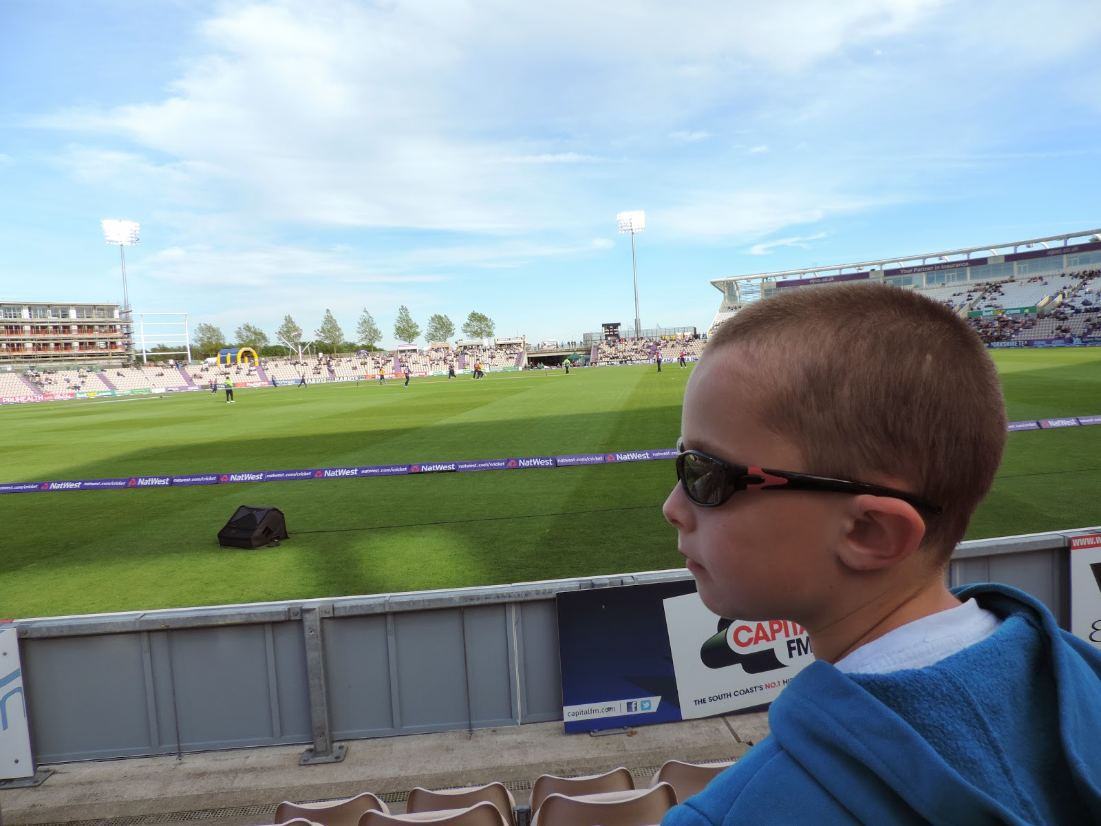 crowd at rose bowl southampton boy in sunglasses ageas bowl natwest blast t20 county match