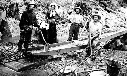 1850 Woman and Men in California Gold Rush | A woman with three men panning for gold during the California Gold Rush Image: 1850 Woman and Men in California Gold Rush | A woman with three men panning for gold during the California Gold Rush