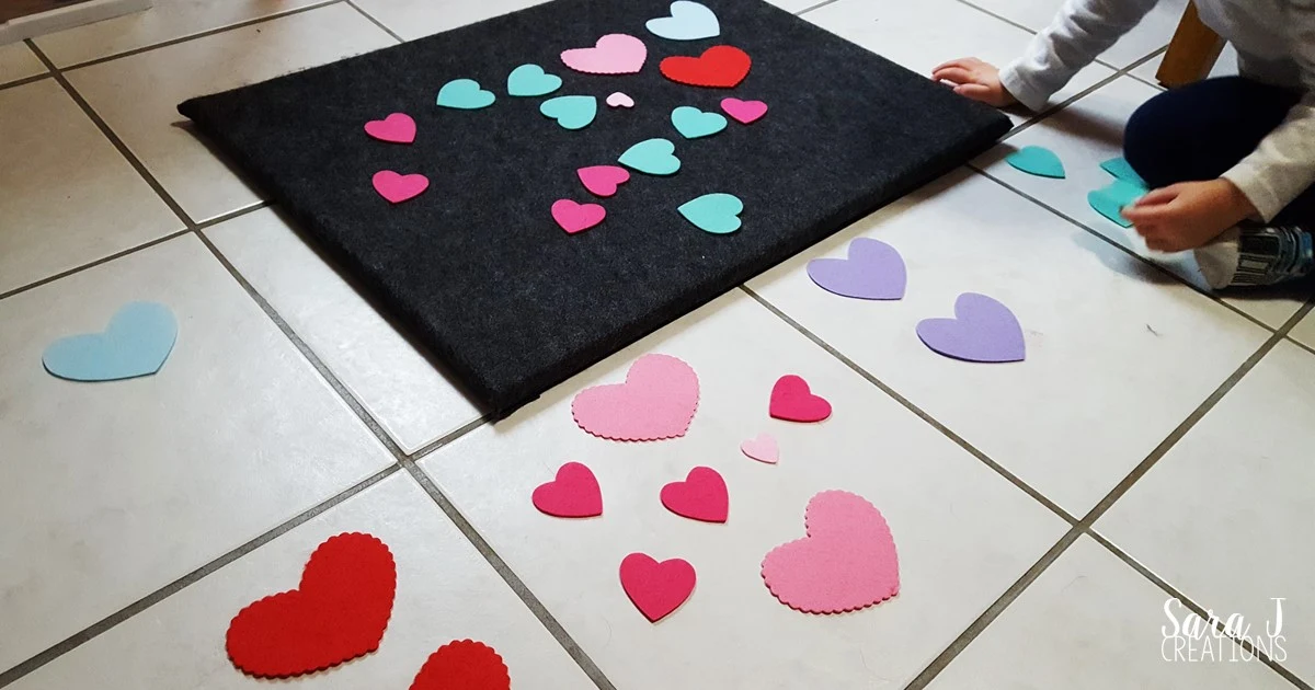 Basic math practice for toddlers and preschoolers using felt hearts to make learning fun and hands on,