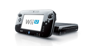 Fotografía de la consola Wii U. Se muestra el Game Pad y la CPU con boca para DVDs
