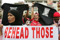 http://littlegreenfootballs.com/article/24746_Religion_of_Beheading