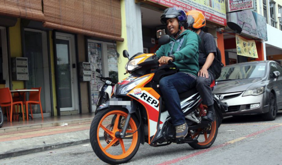 Motorbike Taxis take to the streets of Kuala Lumpur AUTOMOLOGY
