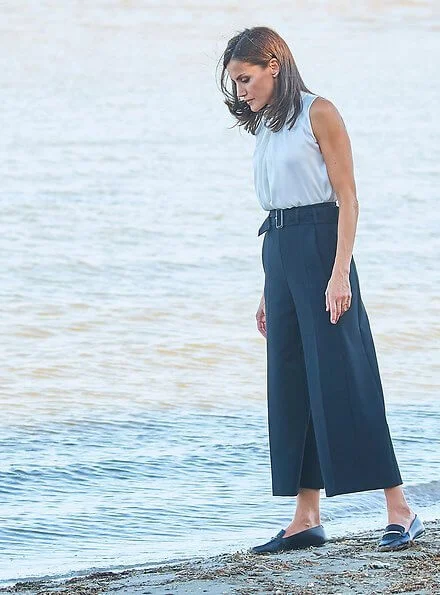 Queen Letizia wore Hugo Boss Iyabo silk top, Boss cropped wide leg trousers and hugo boss Italian-leather flats