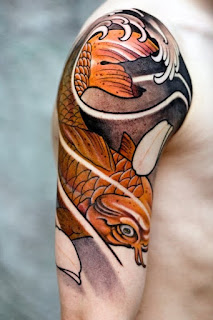 el mejor tatuaje de pez koi naranja