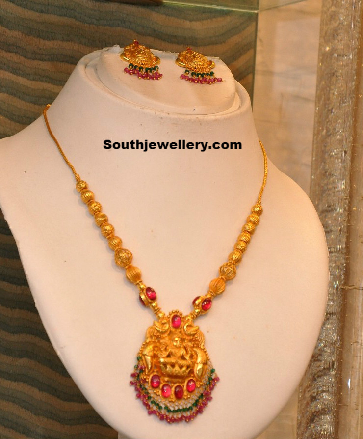 Gold Necklace with Lakshmi Pendant - Jewellery Designs