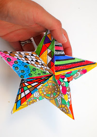 Doodle some designs on these awesome 3D paper Christmas Stars- great Kids art project