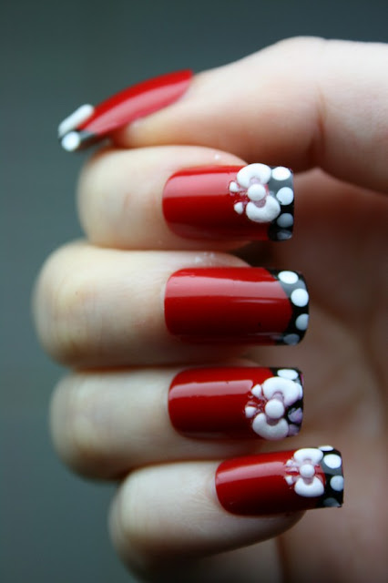 Gorgeous Red Nails with White Flowers and Black Border