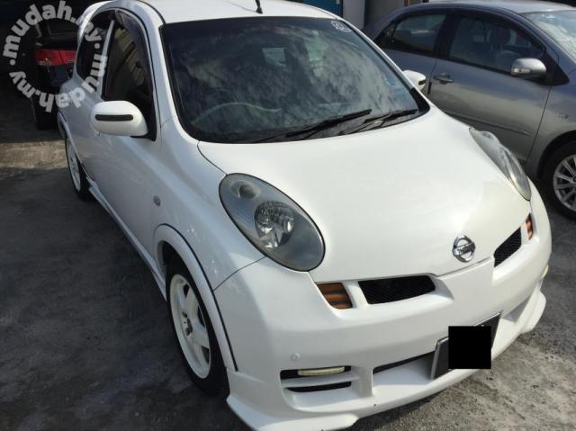 Nissan March k12 коричневый