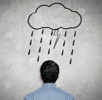 Photo of a man's head from behind, against a gray background, with a sketched cloud raining over his head