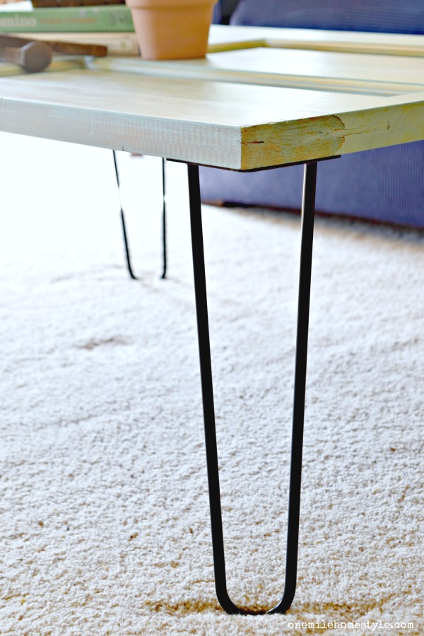 DIY weathered farmhouse coffee table with black hairpin legs