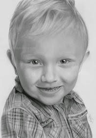 21-Smiling-boy-Rajacenna-Photo-Realistic-drawings-from-a-novice-Artist-www-designstack-co