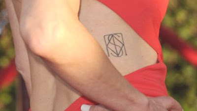 kyra sedgwick back tattoo