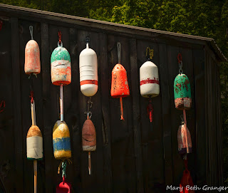 colorful lobster buoys photo by mbgphoto