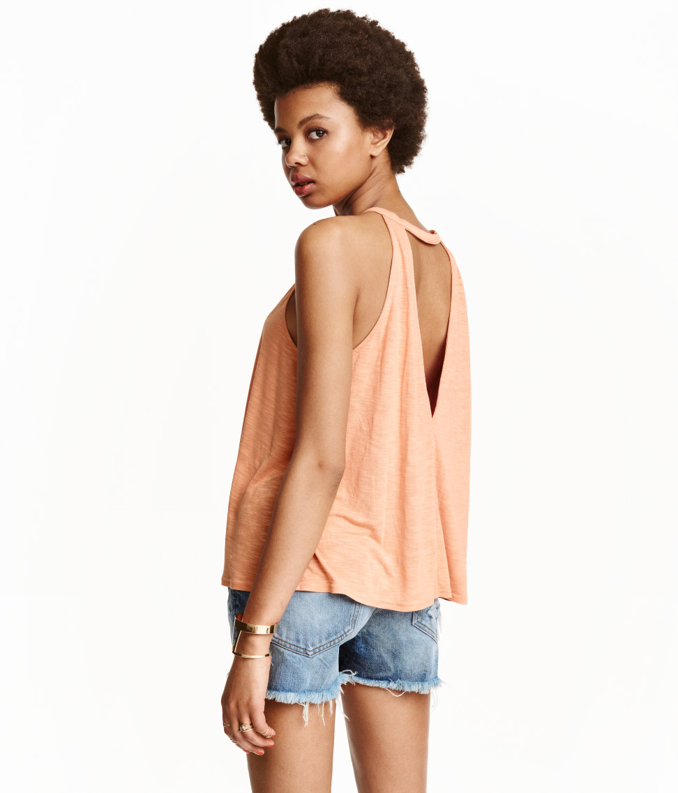 Ten NonBoring Tops that Hide a Belly Pretty Real