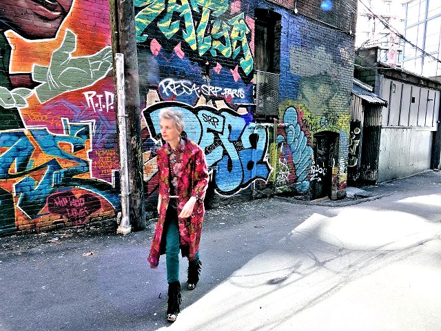 Mel Kobayashi, Bag and a Beret, fuchsia coat in graffiti alley