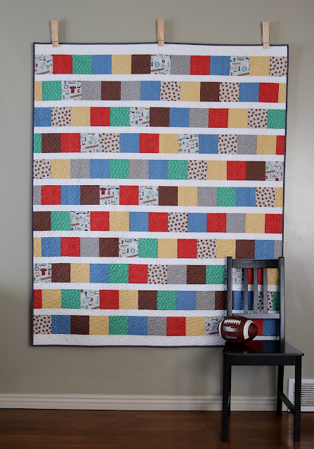 Line Up quilt tutorial by Andy of A Bright Corner - charm pack quilt or layer cake quilt tutorial