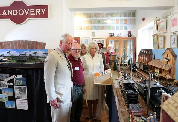 Prince Charles and Camilla, the Duchess of Cornwall visited Llandovery Railway Station to help celebrate the 150th anniversary. Fashions of Royals