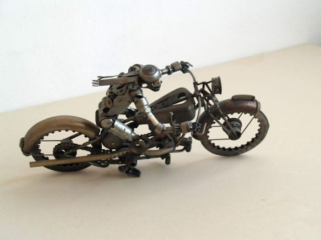 steampunk sculptures from old car and motorcycle parts