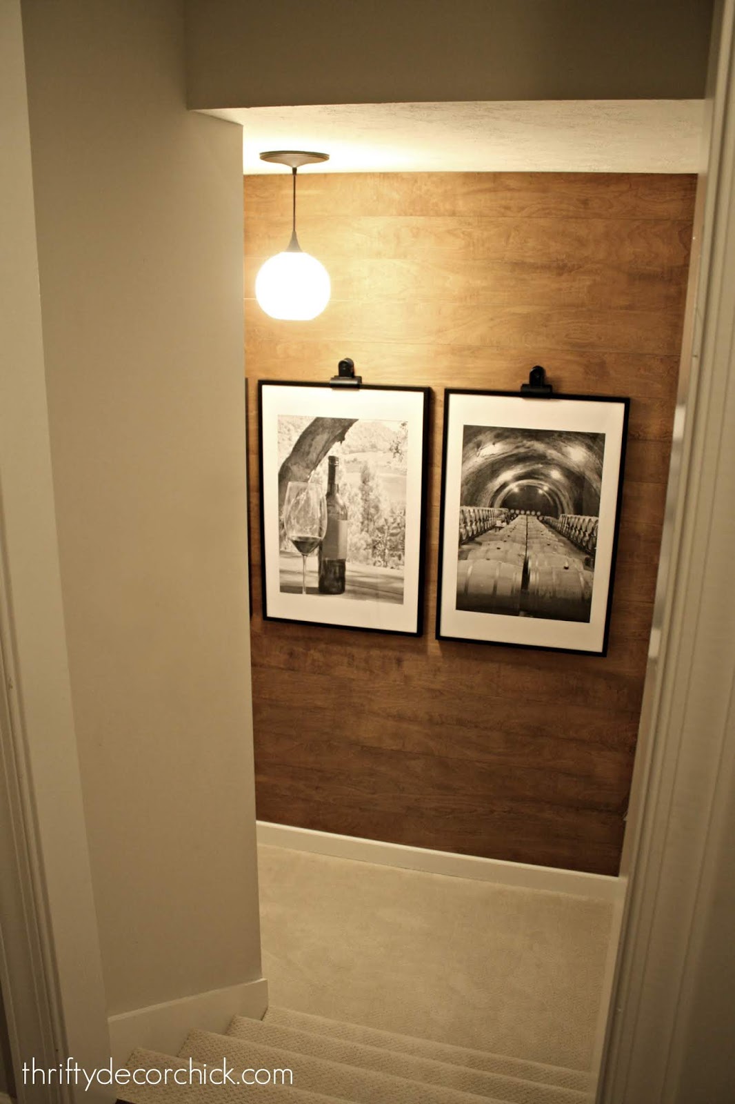 DIY wood stained wall with large frames