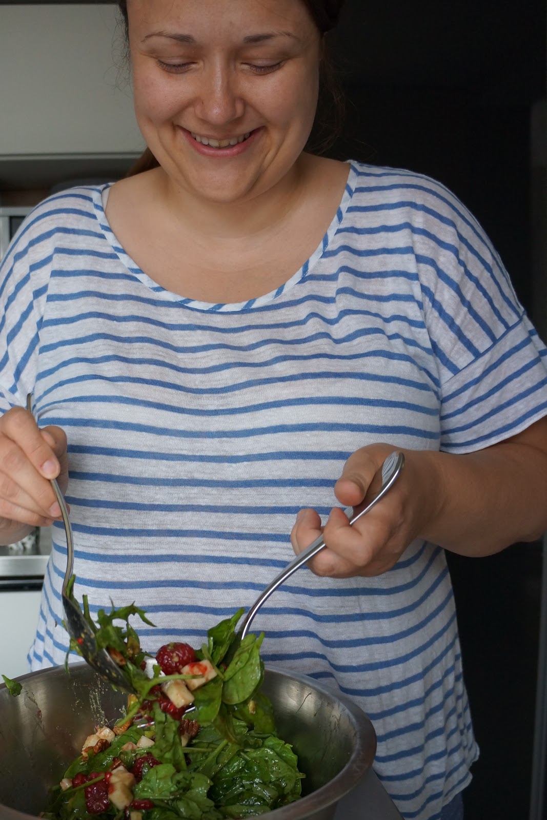 woman making a salad