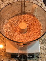 Almond meal. https://trimazing.com/ Photo of 4 cups of raw almonds processed into a nut meal. https://trimazing.com/