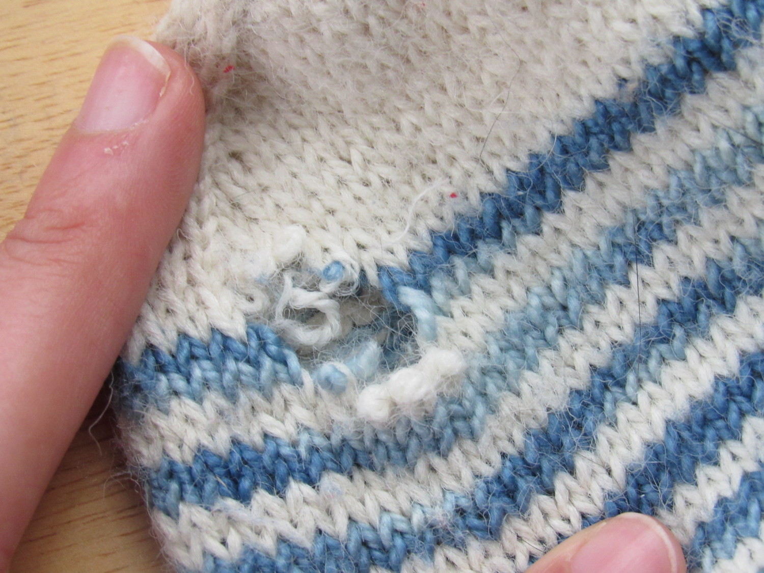 Knit, Click, & Stir Holes in Sweaters & Better Weather