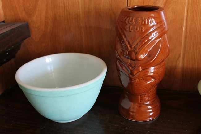 blue pyrex bowl and vintage tiki mug