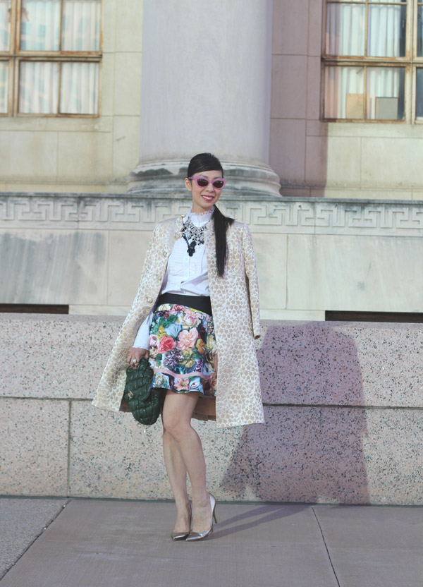 ted baker london decoupage floral skirt, ann taylor ruffle collar top, lookmatic patti goes to paris sunglasses, valentino gold pumps, Forever 21 and Zara crystal bib necklace, opera coat, chanel bubble quilt bag