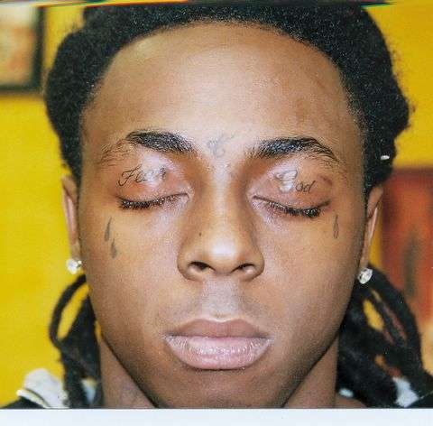 Above Lil' Wayne's Fear of God eyelid tattoos See the tattoo process