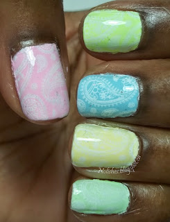 Nail stamping manicure featuring light pink, yellow, green and blue pastel neon polishes, stamped with white paisley print
