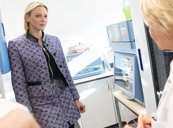 Princess Charlene wore Louis Vuitton lurex monogram tweed fitted jacket and bi-material dress and Dior stretch suede boots