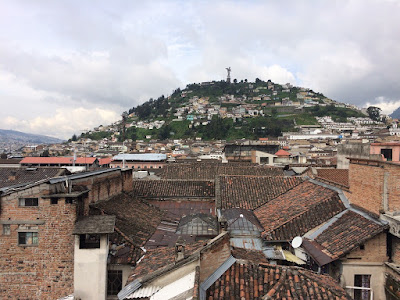 view of panecillo from roof of San Francisco hotel in Quito