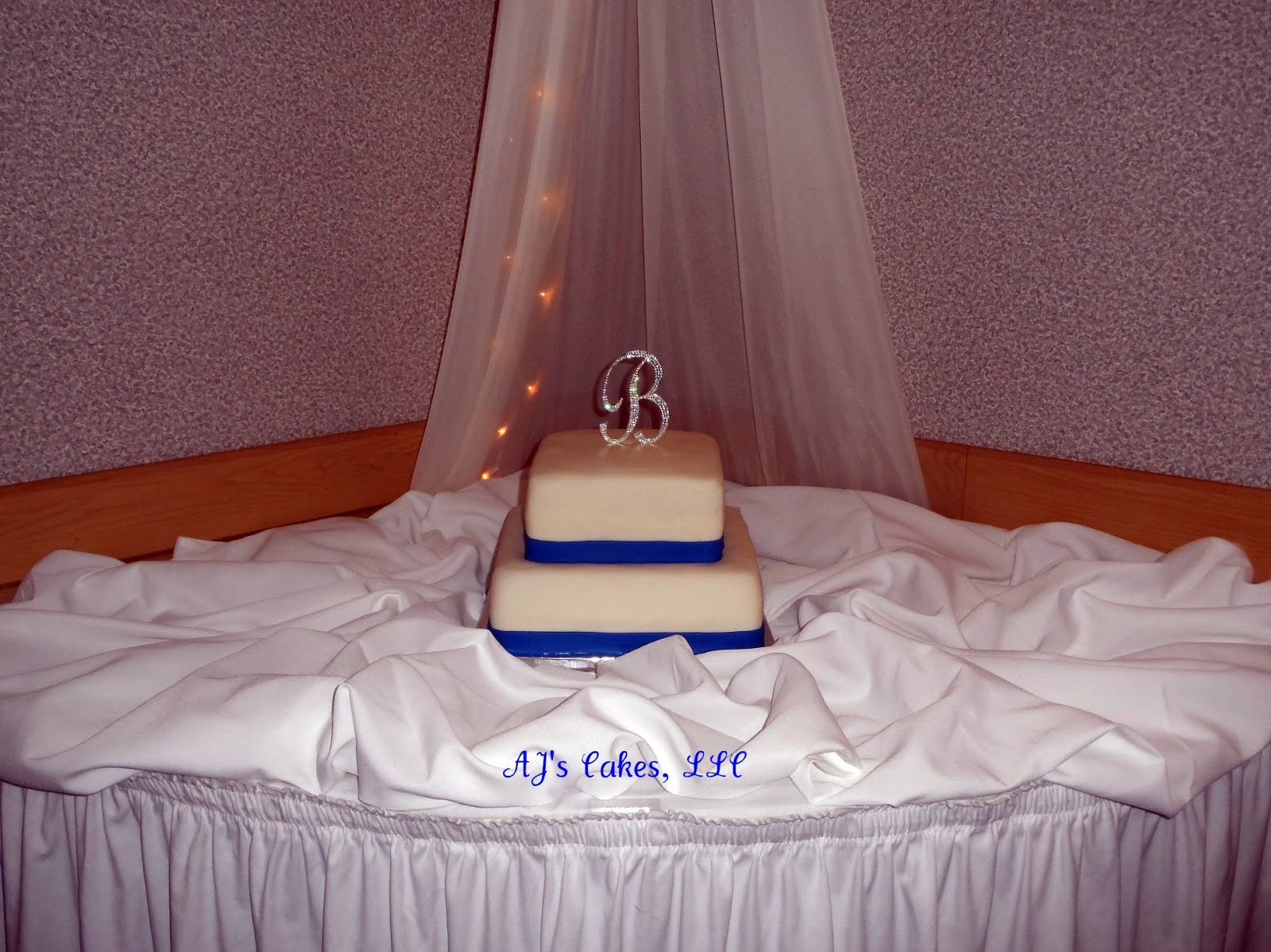 AJ's Cakes: White and Royal Blue Wedding Cake