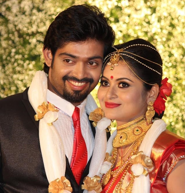 Sruthi Lekshmi and Avin Anto during their wedding reception