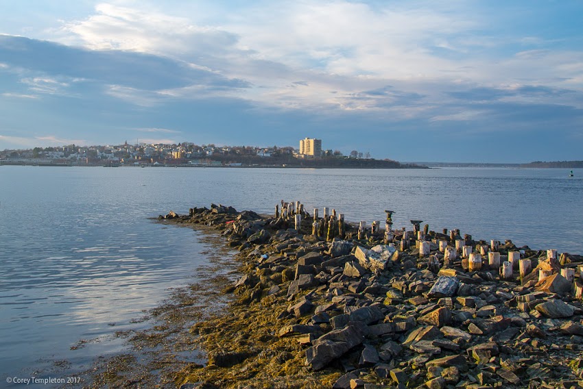 Portland and South Portland, Maine USA April 2017 photo by Corey Templeton. A pleasant scene from Bug Light Park in South Portland looking across the harbor.