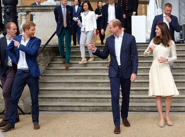 Prince William and Prince Harry . Kate Middleton wore See By Chloe cotton blend dress, Monsoon Fleur wedges and Acne Studios Leather waist belt