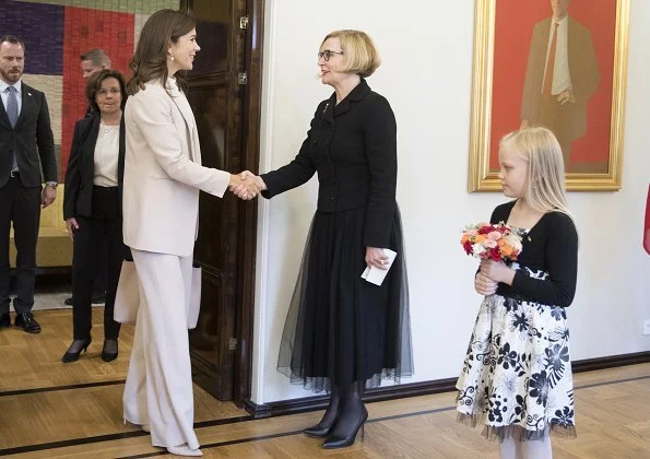 Princess carries Prada bag. Crown Princess Mary wore Massimo Dutti Pantsuit and Isabel Marant blouse